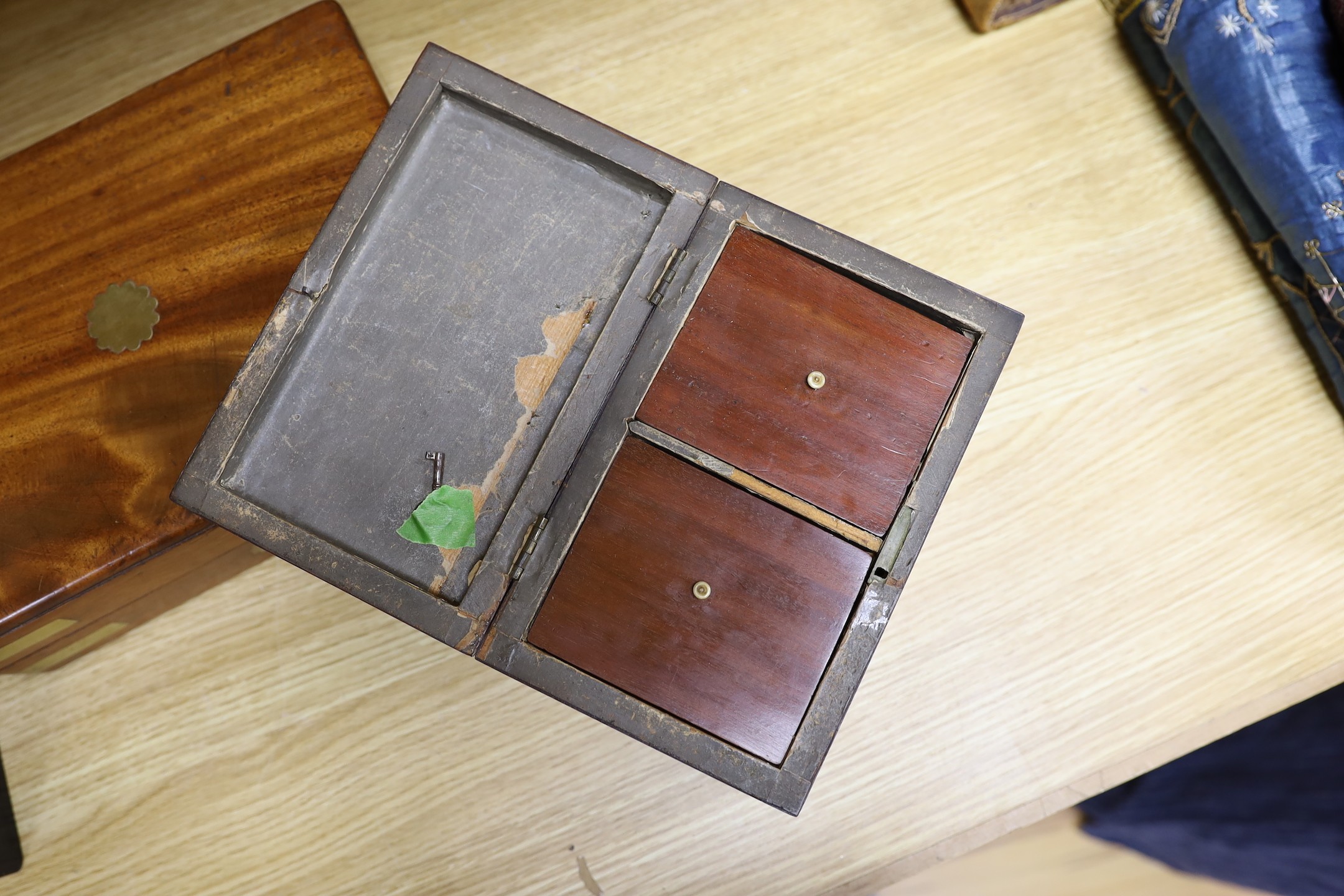 A Victorian mahogany brass bound sewing box, a mother of pearl and silver metal inlaid ebony tea caddy and another caddy, Ebony caddy 19 cms wide x 9 cms high